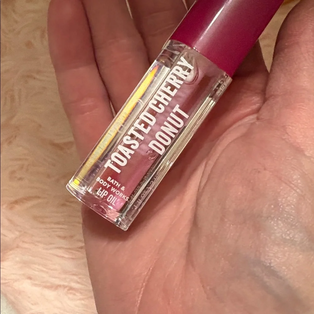Price FIRM New Bath Body Works Toasted Cherry Doughnut Lip Oil